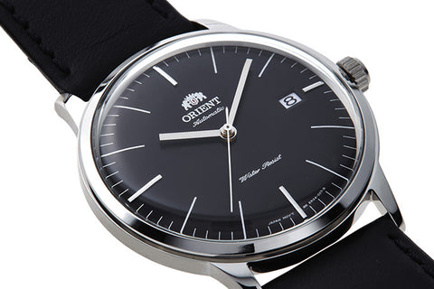 Bambino Contemporary SAC0000DB0.A black dial automatic dress watch of 40.5mm case size with domed dial and crystal fitted with a leather strap. Shop now on orientwatch.in