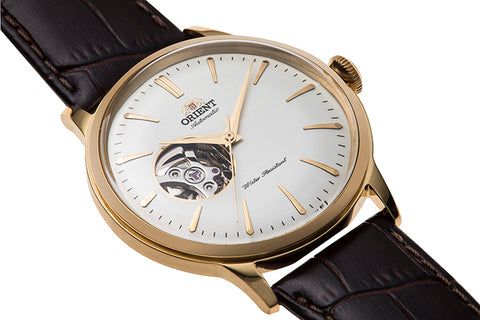 Bambino Open Heart RA-AG0003S10B | RA-AG0003S. A white dial semi skeleton automatic watch with domed dial and crystal, exhibition caseback and fitted with a leather strap. Shop now on orientwatch.in