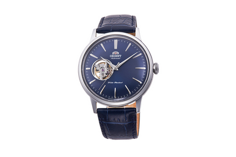 Bambino Open Heart RA-AG0005L10B | RA-AG0005L. A blue dial semi skeleton automatic watch with domed dial and crystal, exhibition caseback and fitted with a leather strap. Shop now on orientwatch.in